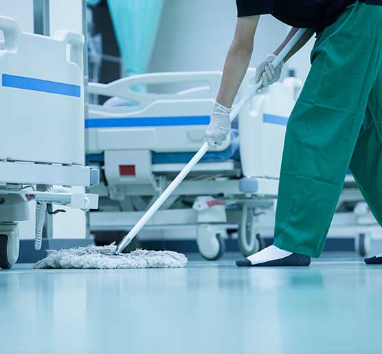 A Hospital Cleaning Specialist cleaning at medical centre